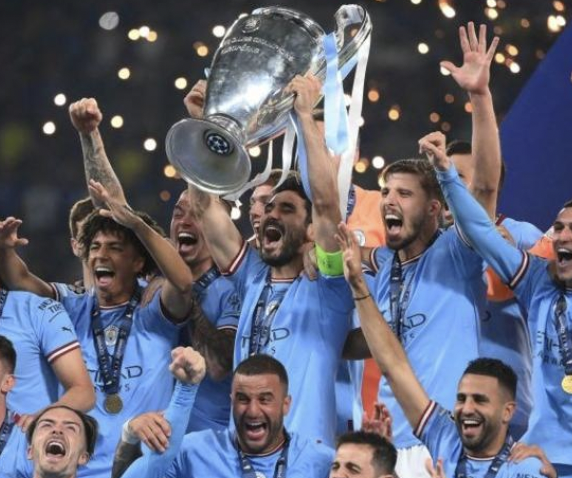 MANCHESTER CITY COMPLETE THE TREPLE