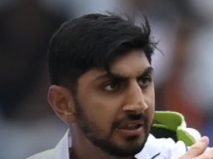 Bashir steers England to top